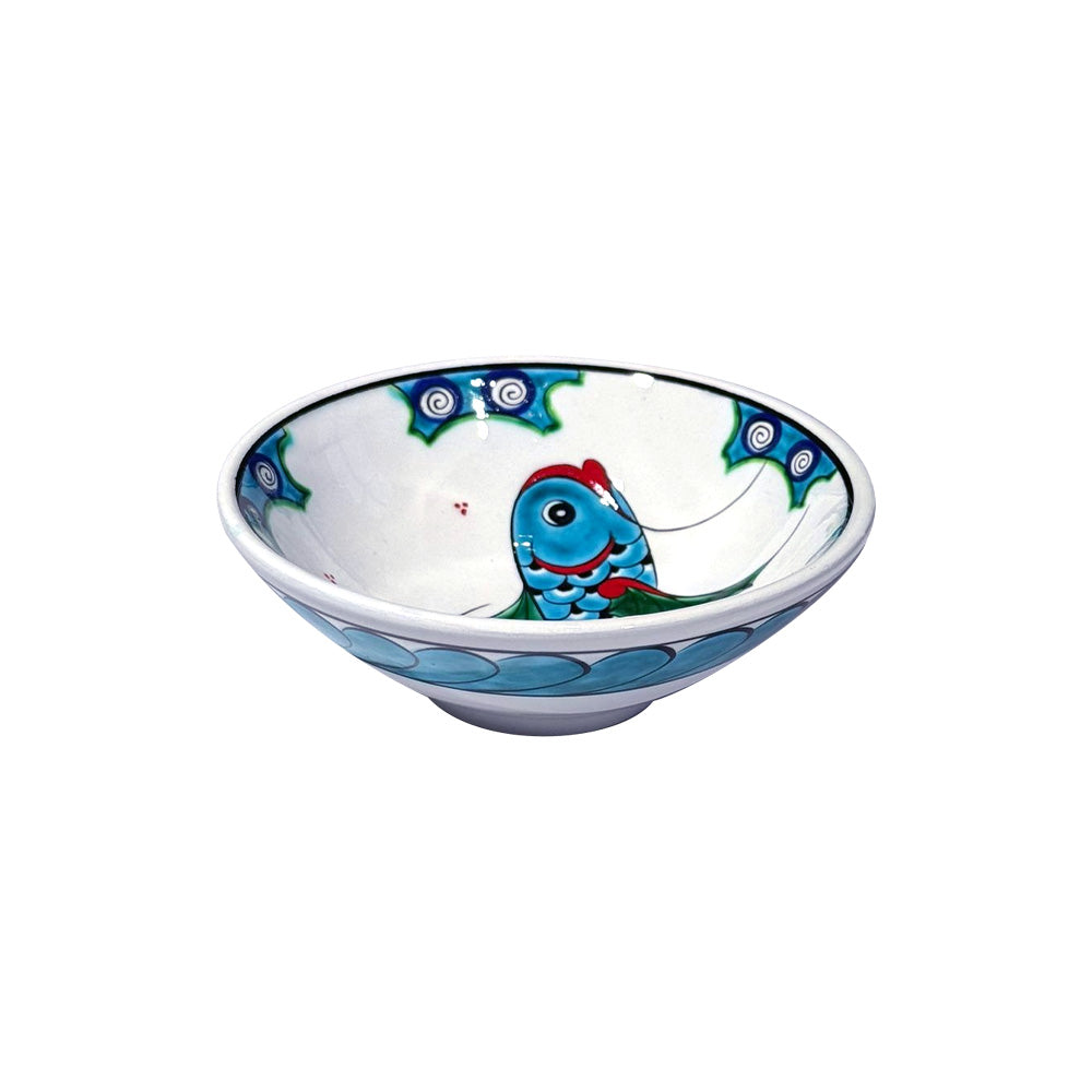 iznik Ceramic bowl with fish design on a white background