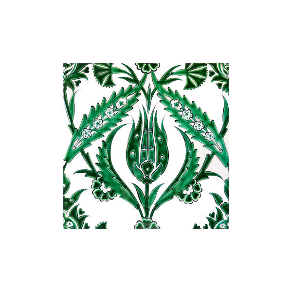 Decorative emerald green iznik tile with floral pattern on a white background