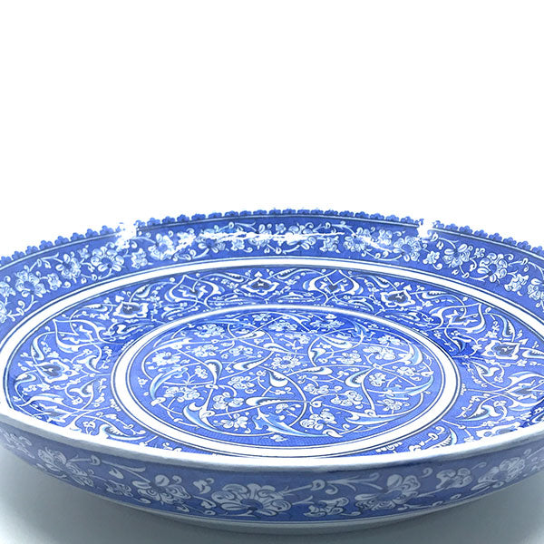 Blue-white iznik deep plate with peony flowers and rumi pattern