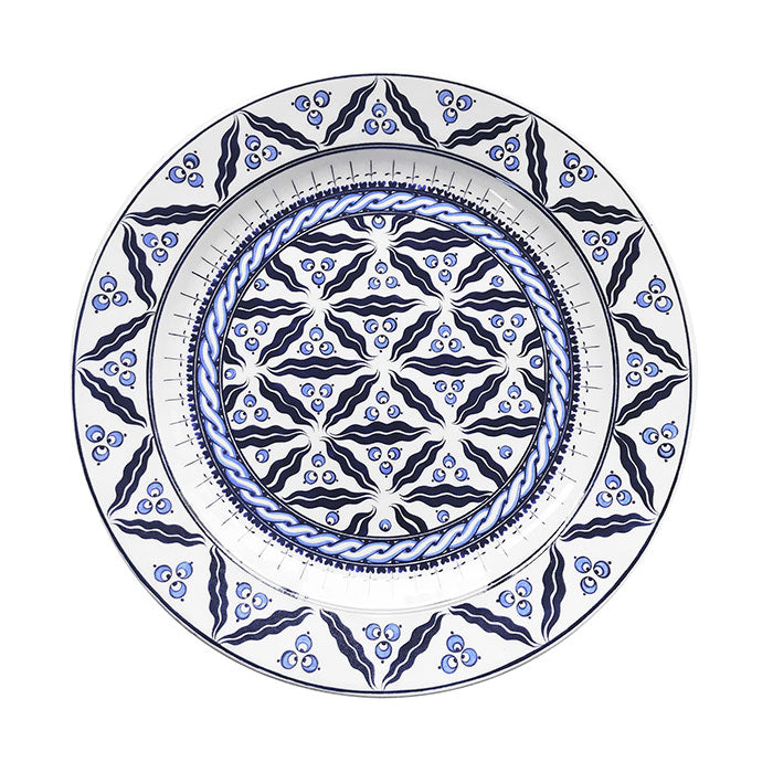 Iznik plate painted with blue-white chintamani pattern.