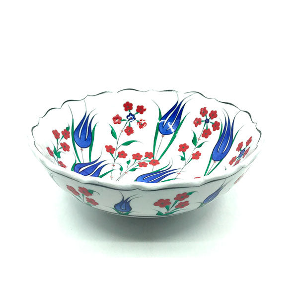 Iznik bowl with blue tulips and coral red flowers