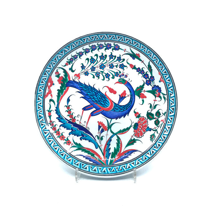 Iznik ceramic deep plate depicting peacock