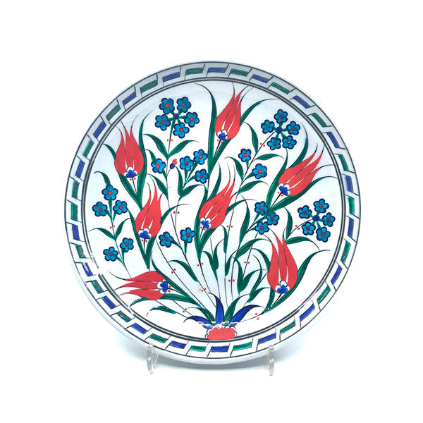 Iznik deep plate decorated with tulips and turquoise flowers