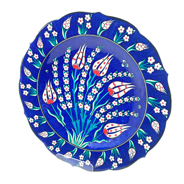 Iznik dish on cobalt blue ground