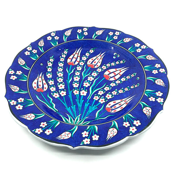 Iznik dish decorated tulips on cobalt blue ground