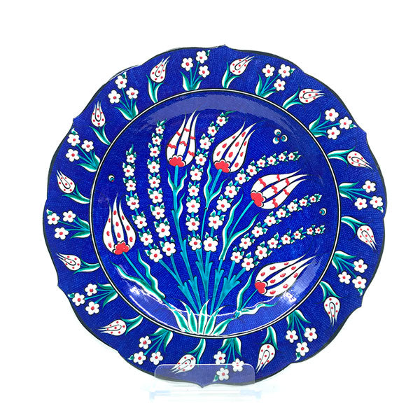 Iznik dish decorated with tulips on cobalt blue ground