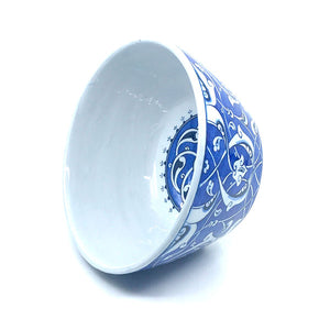 Iznik high bowl blue-white rumi pattern on cobalt-blue ground.