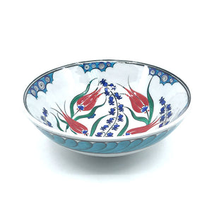 Iznik bowl with cobalt-blue hyacinths and red tulips